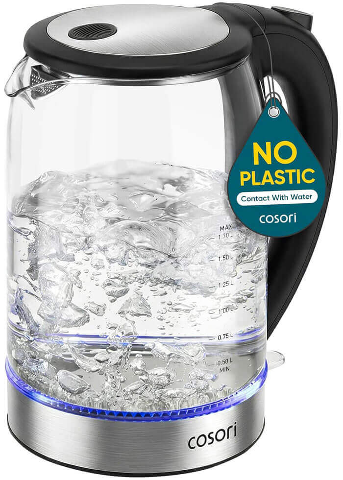 COSORI 1.7L glass electric kettle with black lid on kitchen counter, steam rising, best overall pick for small kitchens