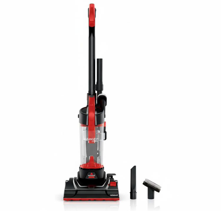Bissell compact vacuum cleaning between fridge and counter, best nook tool for small kitchens