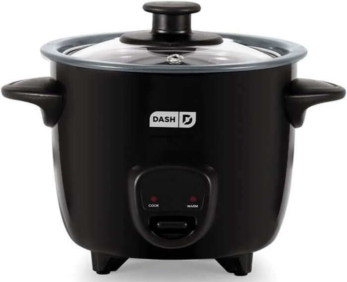 DASH Mini rice cooker in aqua on small apartment counter, ultra-compact size perfect for solo diners and dorm rooms