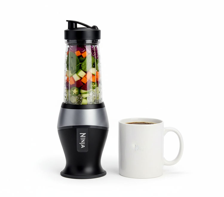 Ninja Fit compact blender with spout lid size comparison next to coffee mug perfect for small kitchens