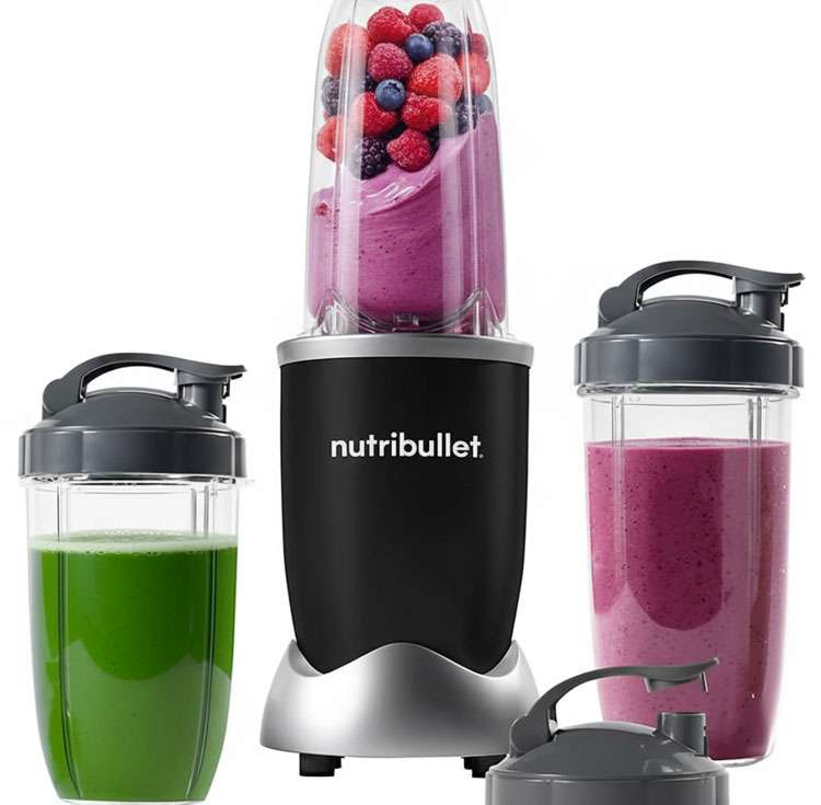 NutriBullet Pro 900 compact blender crushing frozen fruit for smoothies in small kitchen