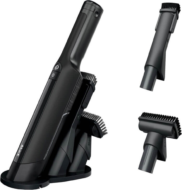 Shark WandVac cordless stick vacuum mounted on wall in small kitchen, ready for quick messes