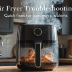 Why Does My Air Fryer Smoke? Air fryer with white smoke rising from top showing common problem
