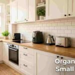 Organize a small kitchen with smart appliances: clean white kitchen counter with only 5 essential appliances arranged neatly